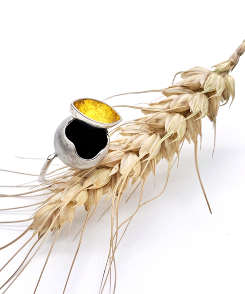 round sterling silver ring with 24k gold