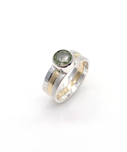 sterling silver ring with 18k yellow gold